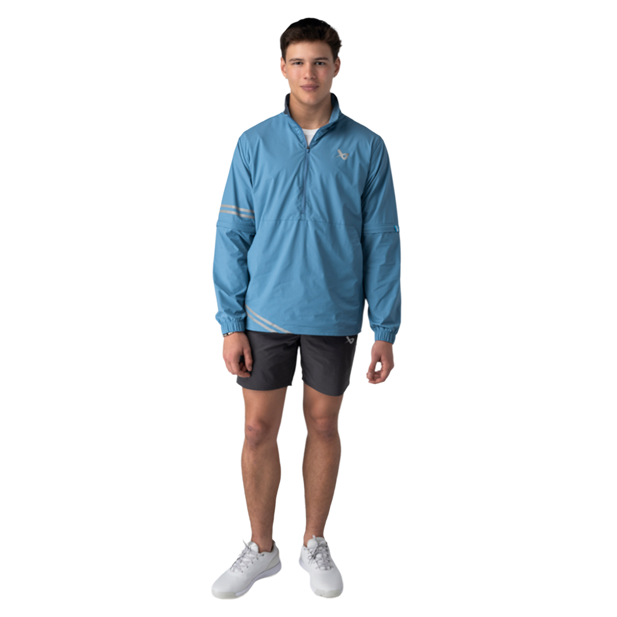 Man wearing a blue jacket and gray shorts on a white background