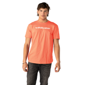 Person wearing a bright orange t-shirt with 'Bauer' logo on a white background